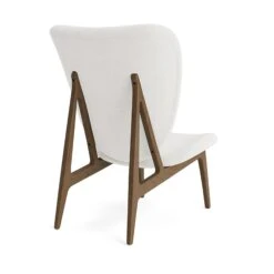 Front Page 35 Front Page -ferm LIVING || MONTANA Shop norr11elephant lounge chair fully upholsteredbarnum boucle col 1 oak light smoked back p